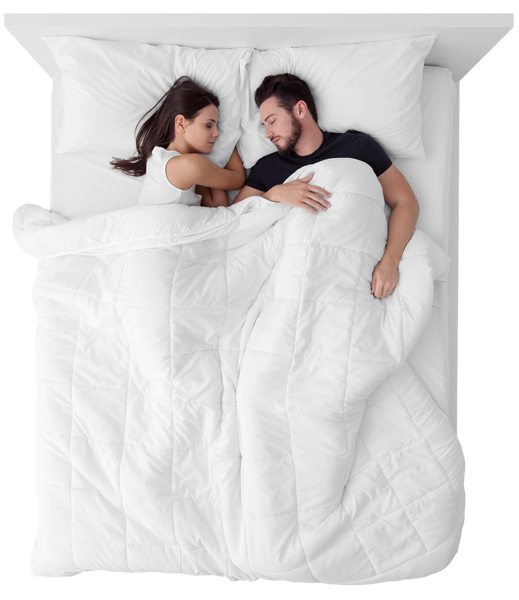 Aerial view of two people sleeping on Bear Mattress and Bear Pillows with white covers