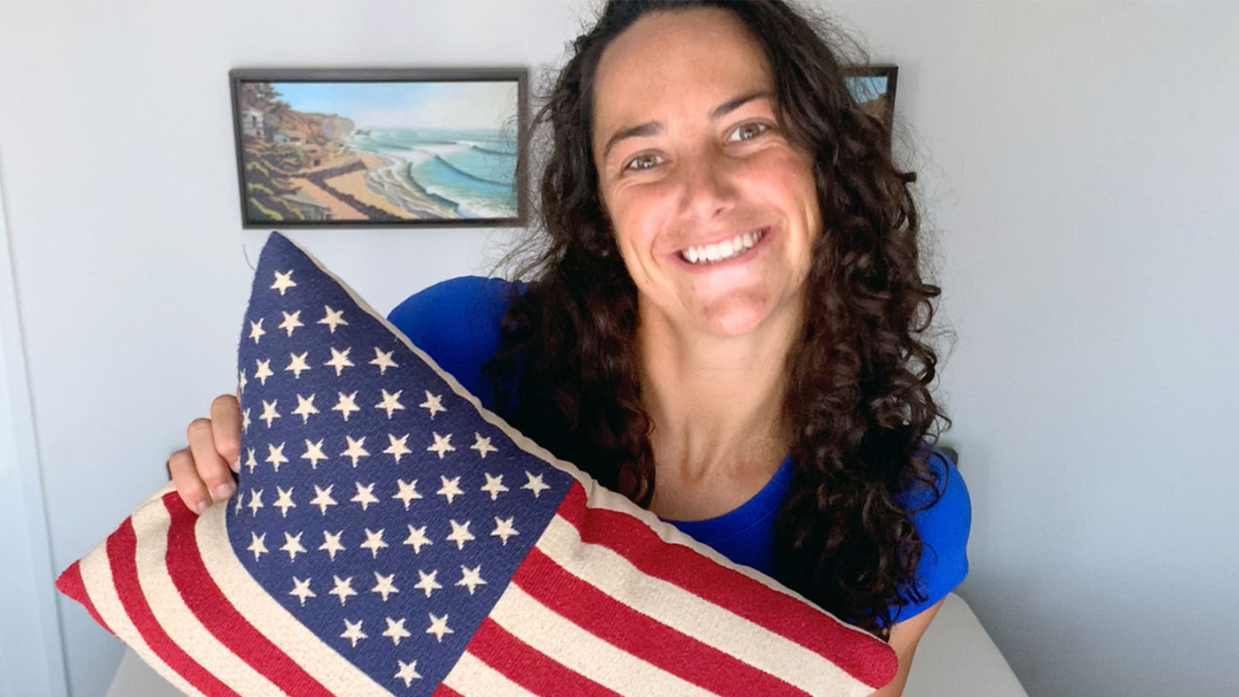 Maggie Steffens with a USA flag pillow
