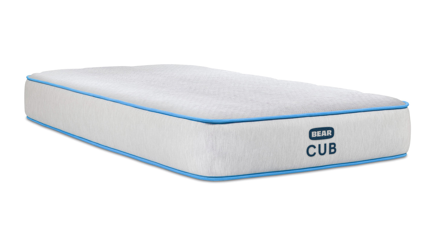 Bear Cub mattress angled view in Arctic Blue color showing premium construction