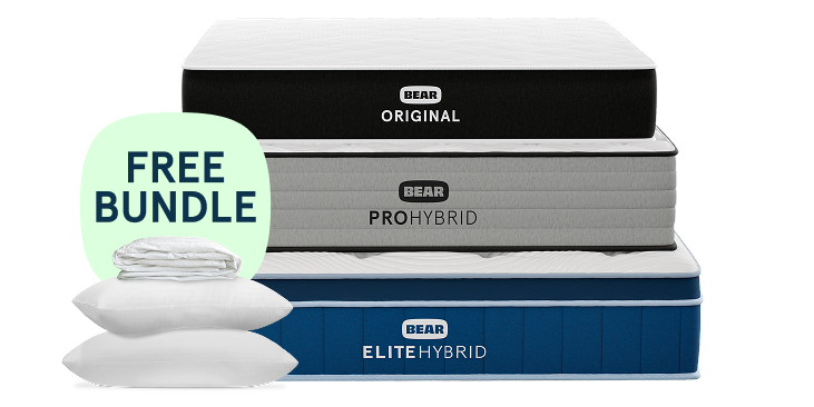 Three stacked Bear mattresses. A mint-green badge on the left says FREE BUNDLE, with two white pillows shown in front.
