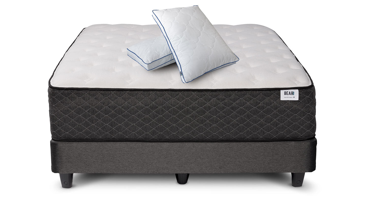 https://www.bearmattress.com/cdn/shop/products/pdp-CloudPillows-Angle-Navy-OnHybrid_1440x.jpg?v=1596811857